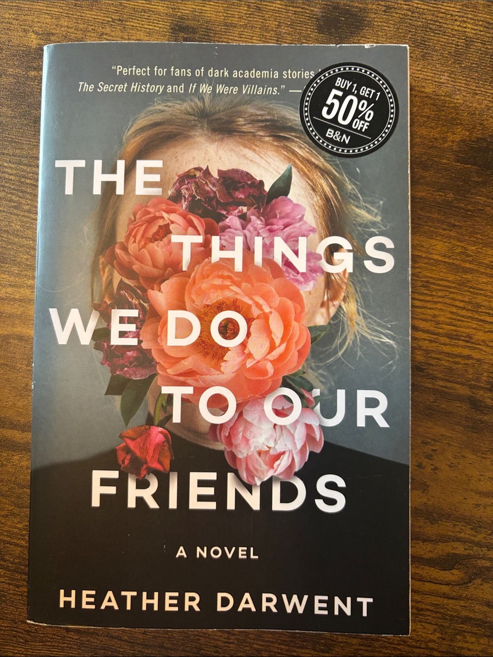 'The Things We Do to Our Friends' — Black Cover with Pink & Orange Floral Art